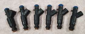 0280155923 Bosch 6 Genuine Injectors 4 Hole 24lb 99-04 Jeep 4.0 Northstar Aurora