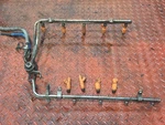 2000-2005 Ford Excursion V10 6.8L Fuel Injection Rail W/ 9 Injectors E6185 Oem. Fixed Price $424.91.