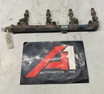 1996-2001 Saturn Series 1.9L Sohc Fuel Injection Rail W/4 Injectors Oem. Fixed Price $86.67.