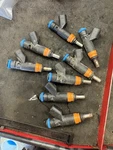 Mopar 5.7L Hemi Fuel Injectors Set Of 68361162AA. Fixed Price $200.00.