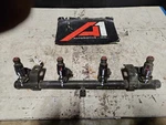 96-97 Dodge Neon Stratus 2.0L(SOHC) Complete Fuel Rail W/4 Injectors Oem. Fixed Price $76.11.