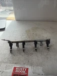 2010 Dodge Caliber Fuel Injectors & Rail 04891575AA. Fixed Price $61.75.