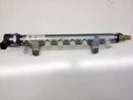 Genuine Volkswagen Fuel Rail 03L-130-089. Fixed Price $752.84.