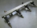 Left Fuel Injection Rail Injector Set 216543 213635 Oem Ferrari 430 F136EA/D V8. Fixed Price $149.99.
